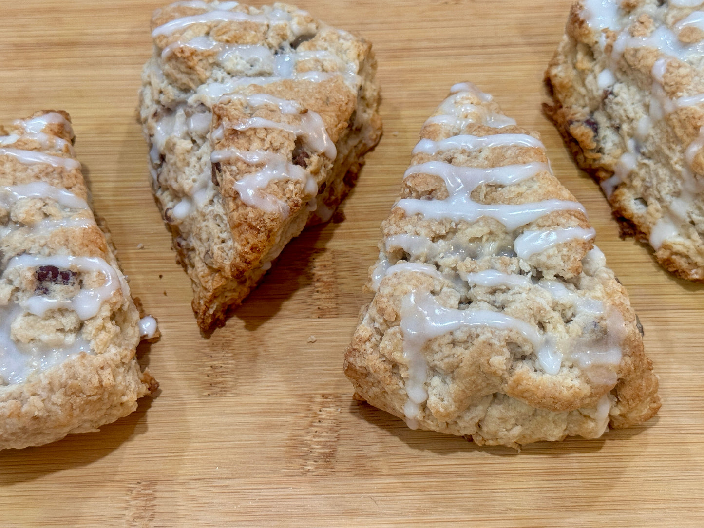 Butter pecan scones on wooden plate 